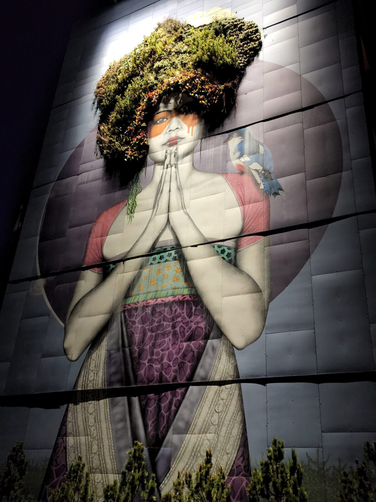 SolTerra Headquarters Building mural at night in Portland, OR