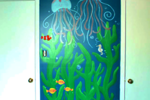 Nursery wall painting of sea kelp and underwater life